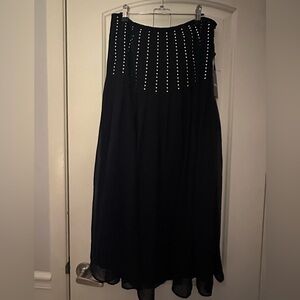 DKNY Elegant Black Garment with Metallic Details